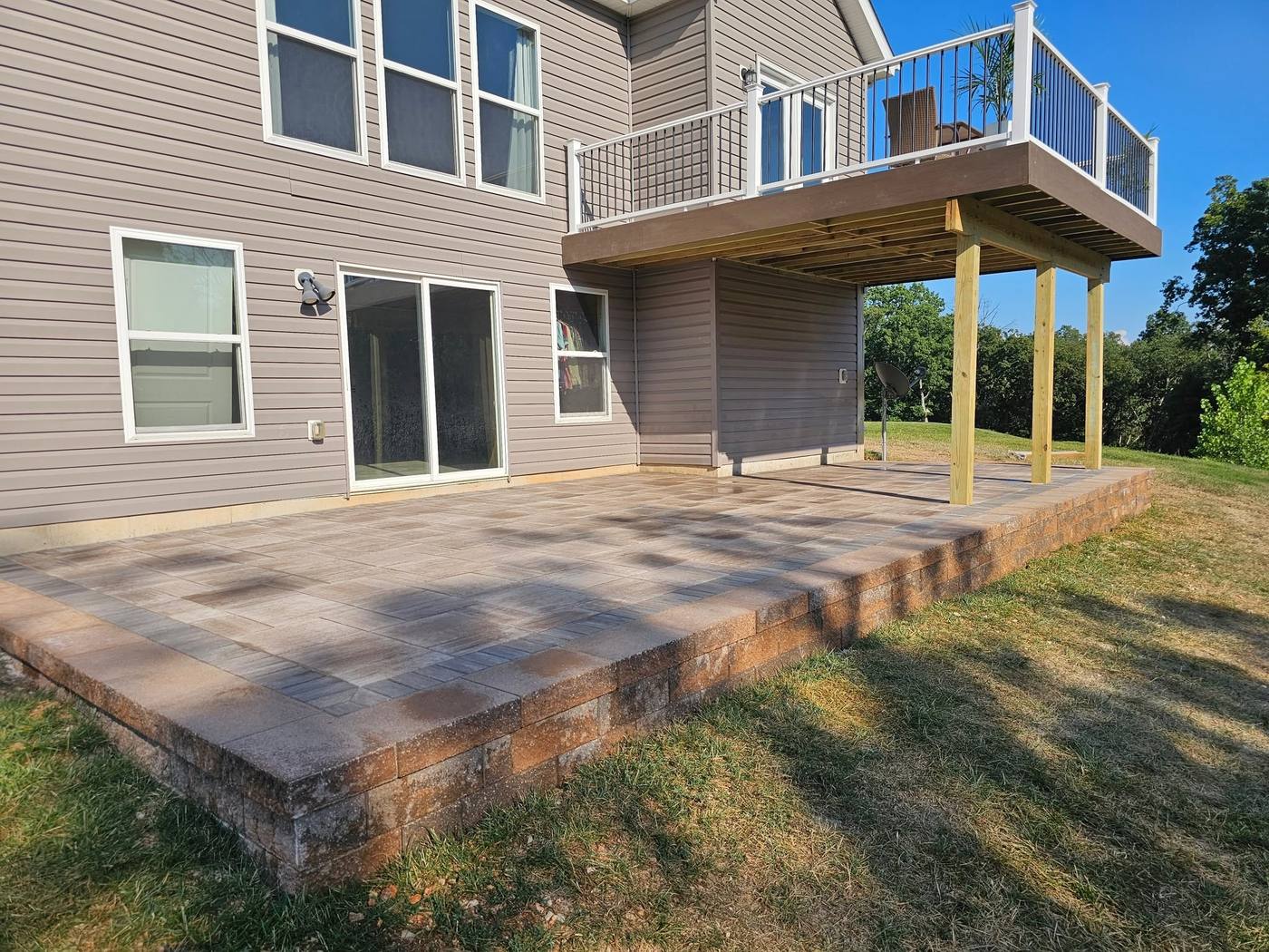 Raised patio under a new deck