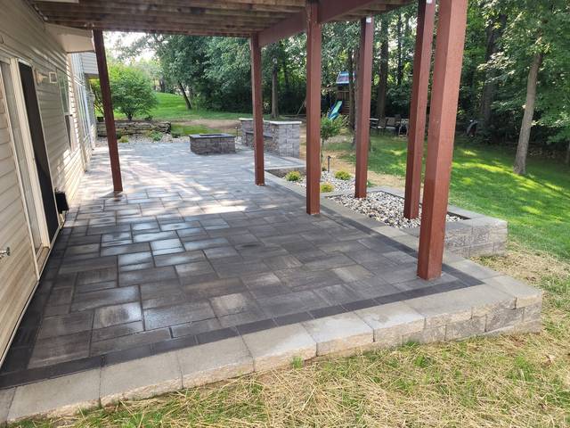 Patio under a deck finished with a border